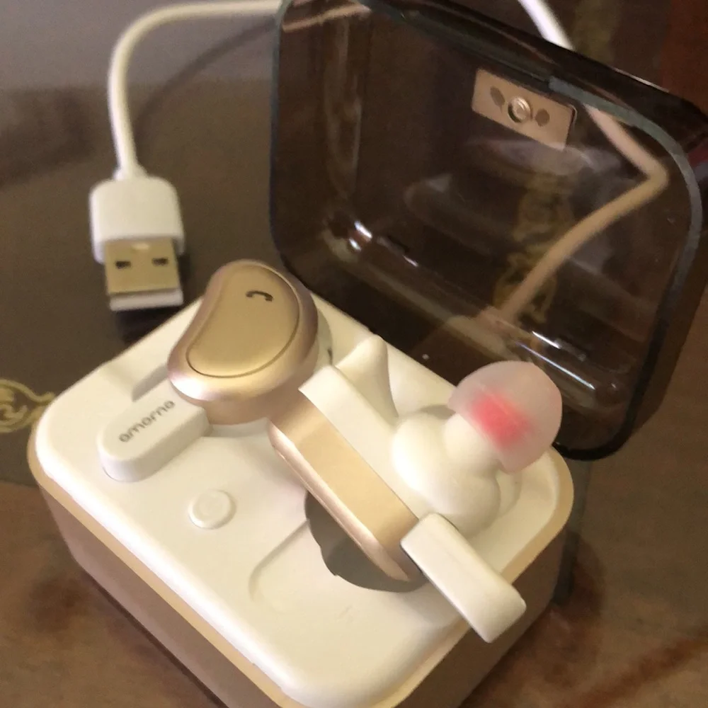 - Blue tooth ear buds. Rose gold. Like new. In case with charge cable.